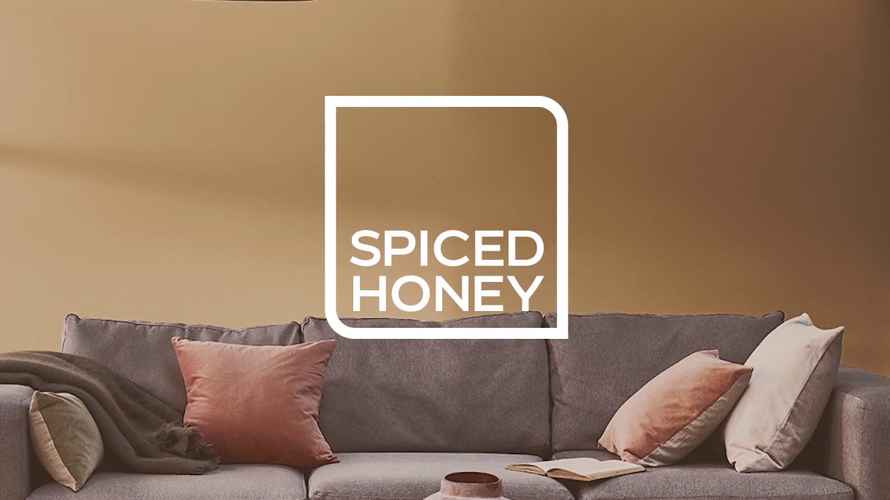 spiced honey room shot with dark grey sofa