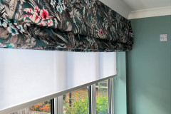 Patterned Large Roman blind with voile roller blind behind Patterned Large Roman blind with voile roller blind behind