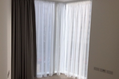 Pencil pleat voile curtains with dim out seamless curtains in front