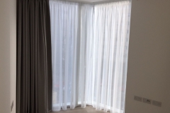 Pencil pleat voile curtains with dim out seamless curtains in front Pencil pleat voile curtains with dim out seamless curtains in front