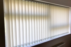 Chainless 89mm vertical blind with sealed in weights