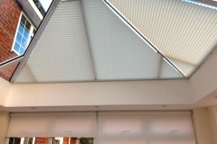 20mm pleated shaped roof blinds and chain rollers all in heat reflective fabric