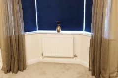 Voile Curtains & Laminated Roller blinds, in a bay window Voile Curtains & Laminated Roller blinds, in a bay window