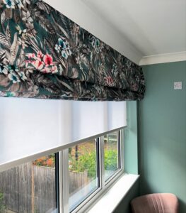 Floral Velvet Printed Roman Blind with voile privacy roller blind installed behind