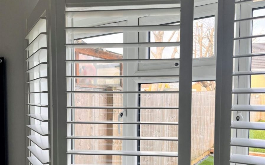 White Shutters with concealed tilts and 76mm Louvres