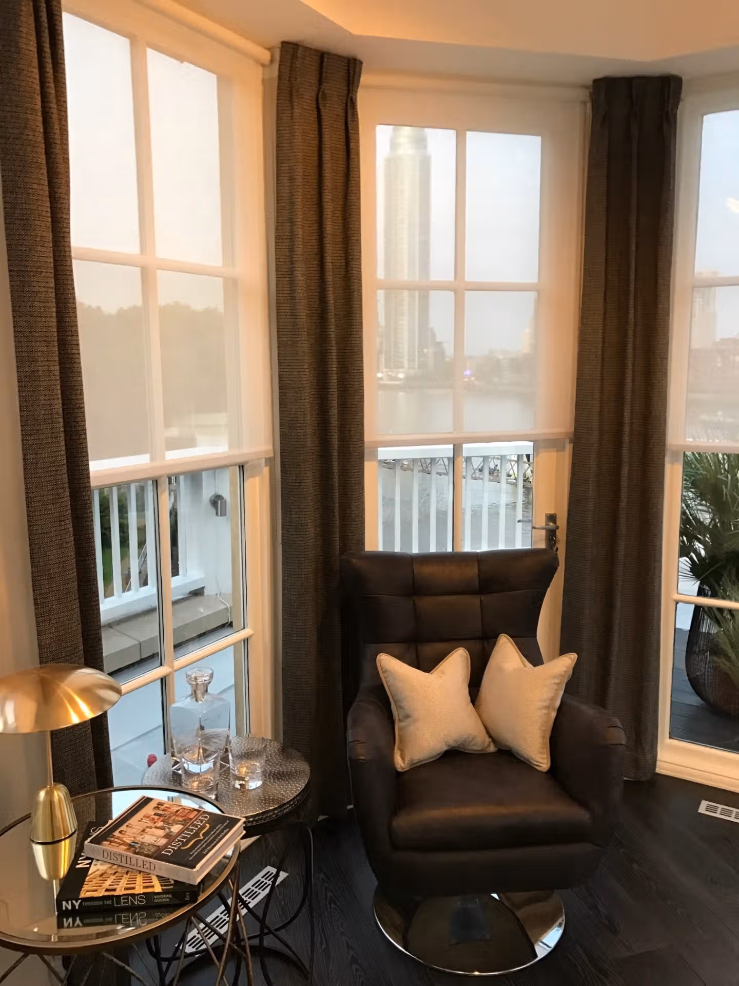 Bespoke curtains and voile rollers fitted by Unidrape in a London apartment
