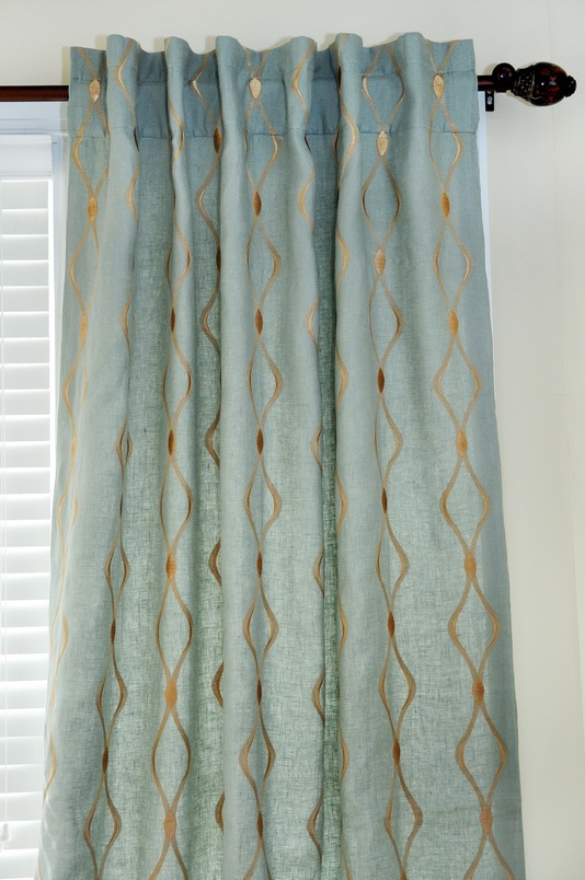 blue curtains with patterns