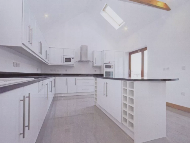 Manhattan High Gloss White Kitchen in Loft apartment in Hatfield. Kitchen design and installation