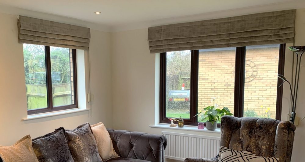 Roman blinds with waterfall headings in Dakota fabric colour Putty installed in Stevenage