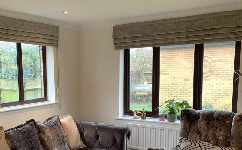 Roman blinds with waterfall headings in Dakota fabric colour Putty installed in Stevenage