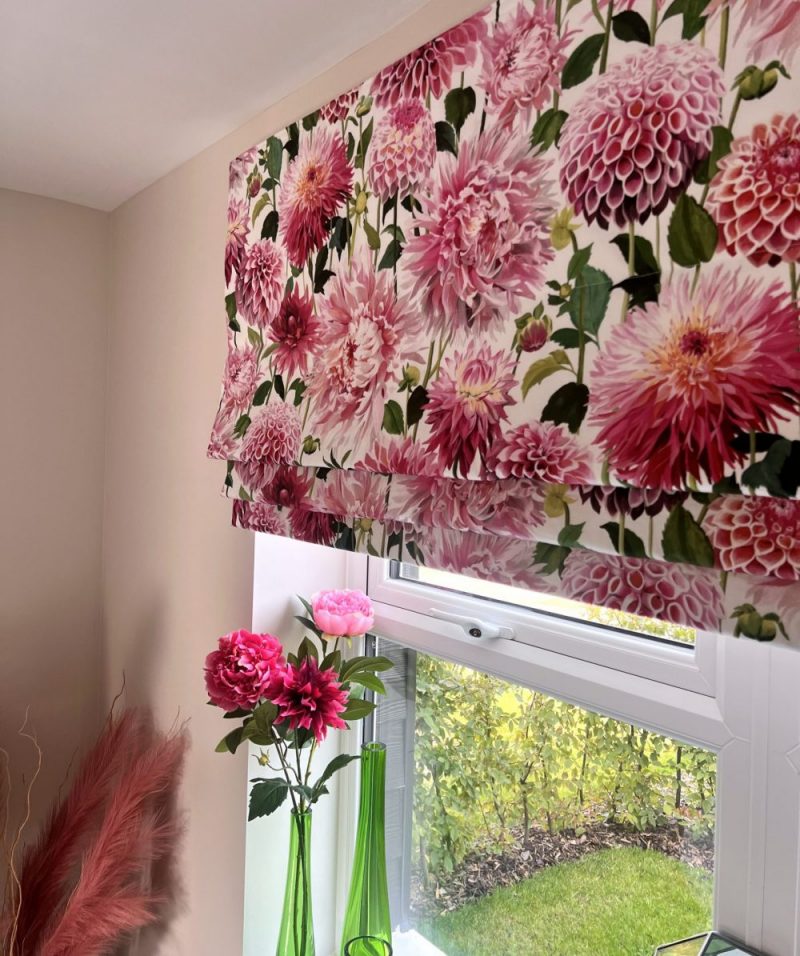 Floral print fabric made to measure roman blind with waterfall style heading. Surveyed and installed in Hertford