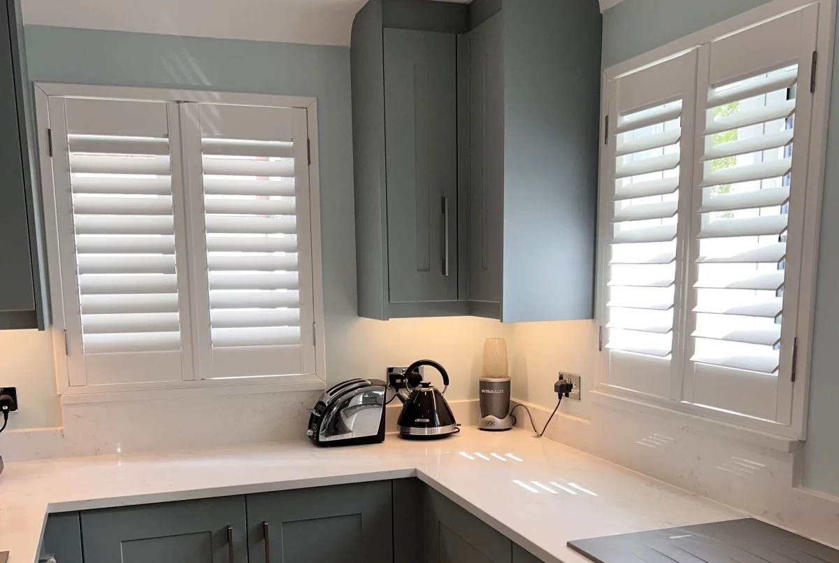 Hampton Faux Wood IK made shutters installed in a newly fitted bespoke kitchen